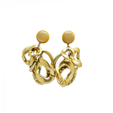 Cargar imagen en el visor de la galería, caravanas de resina doradas