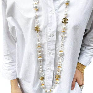 Collar  C H dorado y  perla