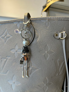 Charm muñeca