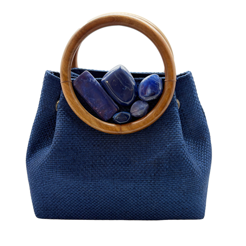 cartera azul con piedras 