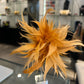 Broche flor de pluma