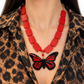 Collar rojo con mariposa, vista 2 – Fahoma